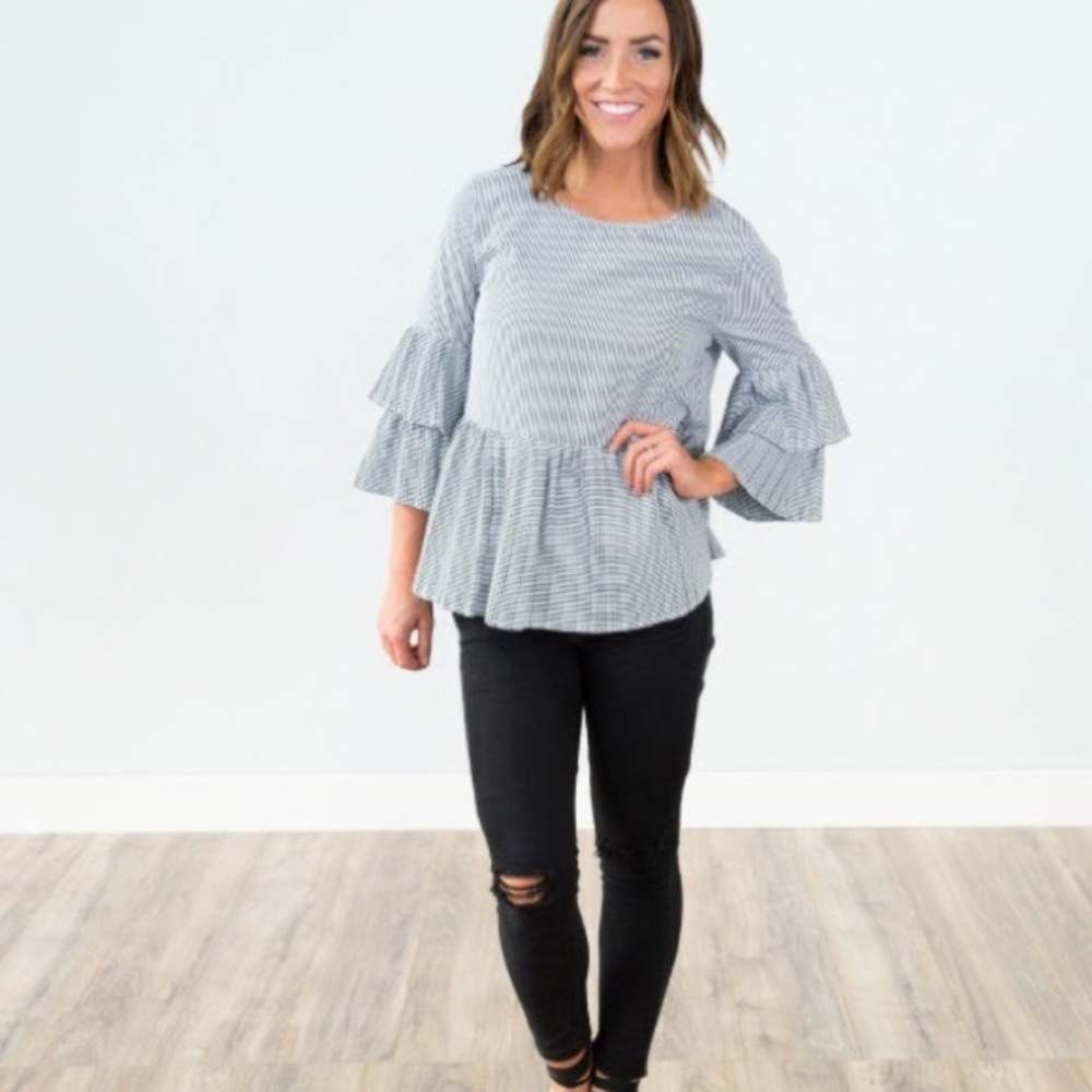 Shop Stevie striped peplum top
